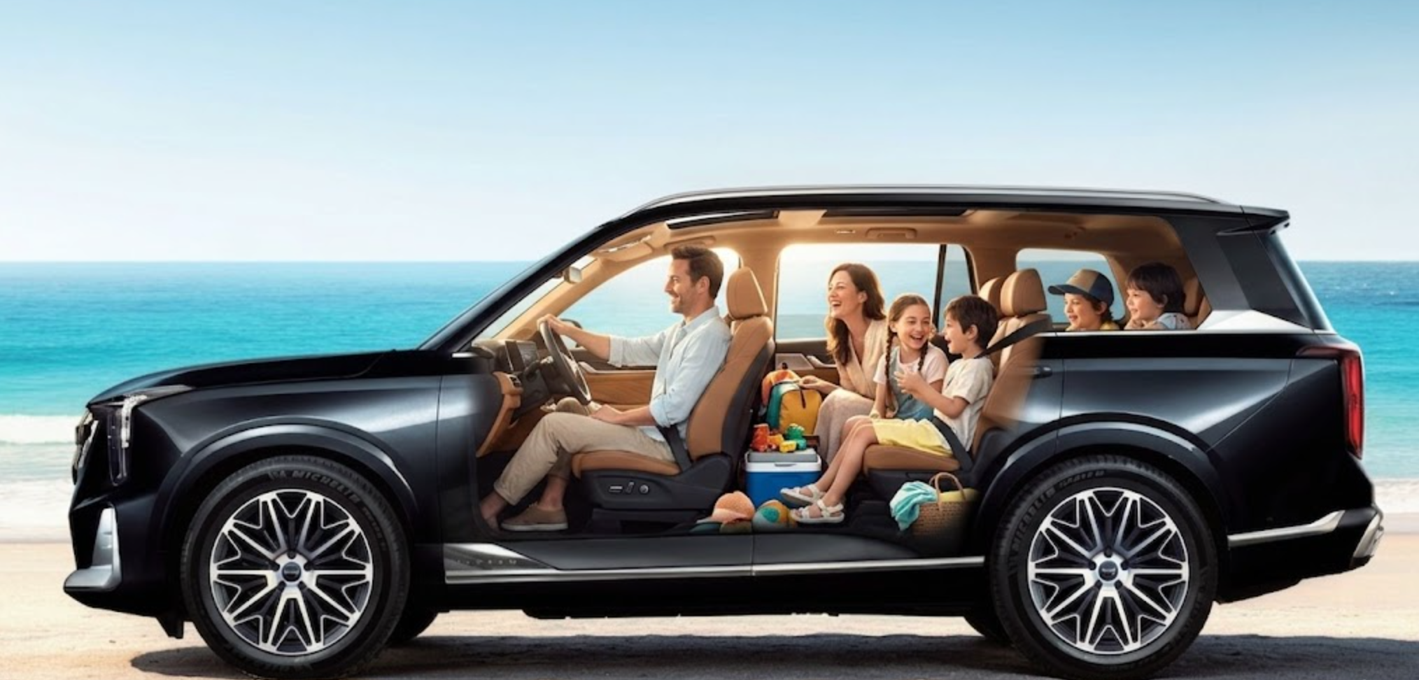 A Family sitting inside the GAC GS8